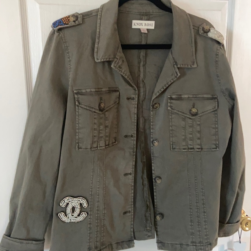 Knox rose jacket with  logos on it